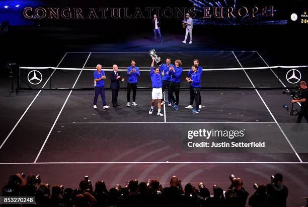 Roger Federer poses with trophy with team mates Marin Cilic, Bjorn Borg, Rafael Nadal, Rod Laver, Alexander Zverev, Tomas Berdych and Dominic Thiem...