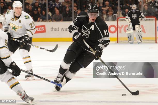 Anze Kopitar of the Los Angeles Kings drives the puck during the game against the Dallas Stars on March 5, 2009 at Staples Center in Los Angeles,...