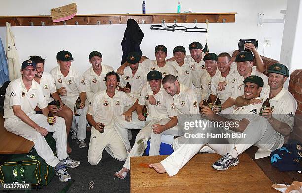 The Australian team celebrate winning their second Test and taking an unbeatable 2 - 0 series lead during day five of the Second Test between South...