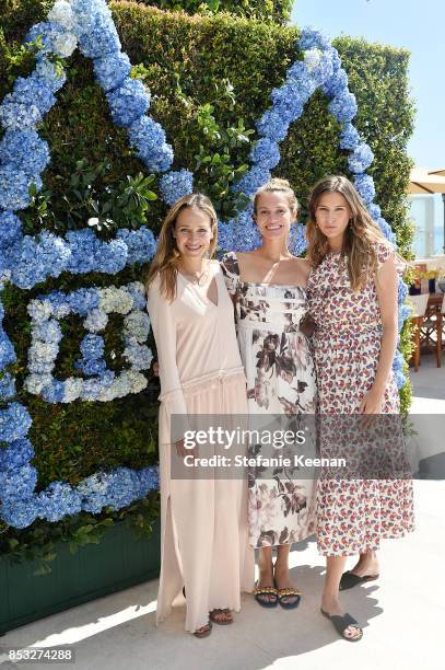 Luisana Mendoza de Roccia, Laura Vassar and Sylvana Ward Durrett attend Maisonette Beach BBQ on September 24, 2017 in Malibu, California.