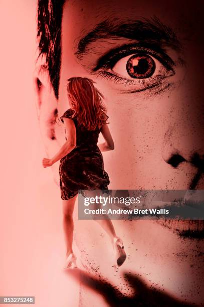 face of a dangerous male predator and a woman running away - psychopathy stock pictures, royalty-free photos & images