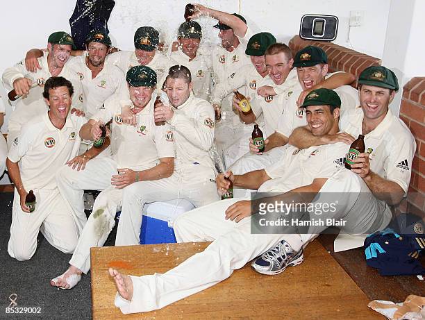 The Australian team celebrates in the changing rooms after winning the Test and taking an unbeatable 2 - 0 series lead during day five of the Second...