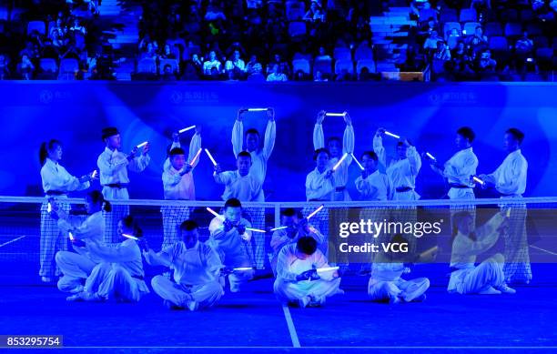 Performers dance during the opening ceremony of 2017 WTA Wuhan Open is held at Optics Valley International Tennis Center on September 24, 2017 in...