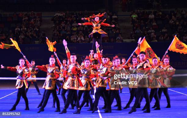 Performers dance during the opening ceremony of 2017 WTA Wuhan Open is held at Optics Valley International Tennis Center on September 24, 2017 in...