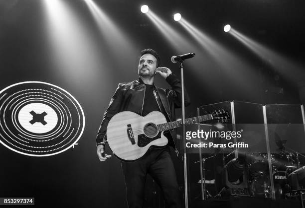 Singer Luis Fonsi performs in concert during Love + Dance World Tour at Coca Cola Roxy on September 24, 2017 in Atlanta, Georgia.