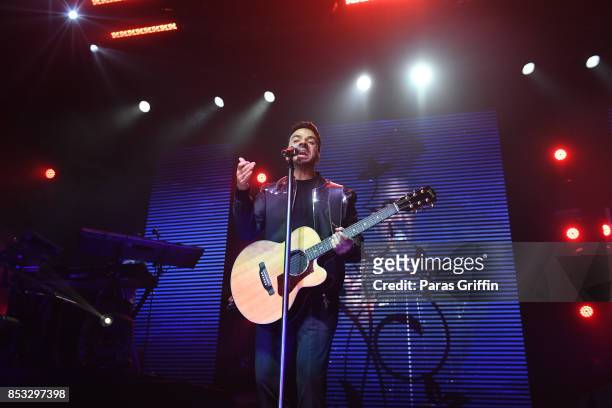 Singer Luis Fonsi performs in concert during Love + Dance World Tour at Coca Cola Roxy on September 24, 2017 in Atlanta, Georgia.