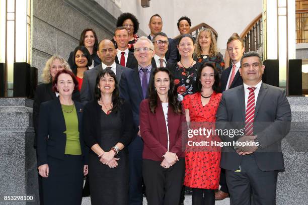 Labour leader Jacinda Ardern poses with fellow MPs during an announcement for Labour's new provisional caucus members at Parliament on September 25,...