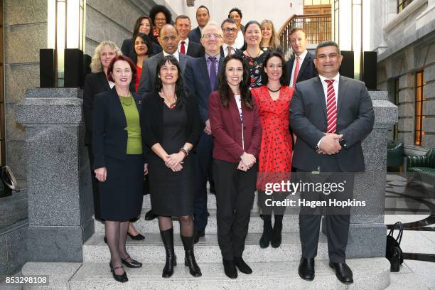 Labour leader Jacinda Ardern poses with fellow MPs during an announcement for Labour's new provisional caucus members at Parliament on September 25,...