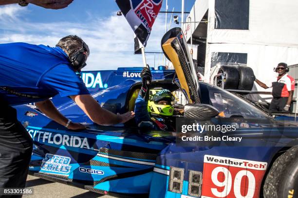 Renger van der Zande, of the Netherlands celebrates in victory lane after winning the IMSA WeatherTech Sportscar Championship race at Mazda Raceway...