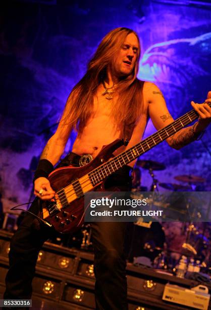 Ted Lundstrom of Amon Amarth performs on stage at the HMV Forum.