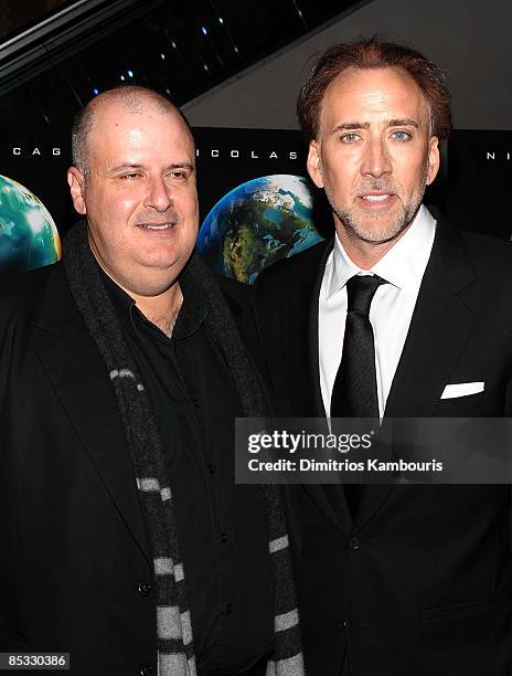 Director Alex Proyas and actor Nicolas Cage attends the premiere of "Knowing" at the AMC Loews Lincoln Square on March 9, 2009 in New York City.