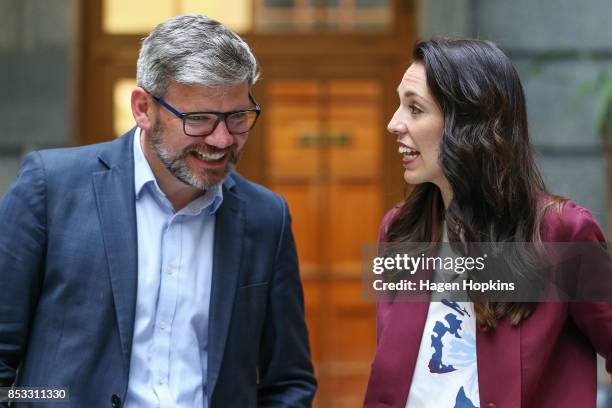 Labour leader Jacinda Ardern speaks to MP Iain Lees-Galloway during an announcement for Labour's new provisional caucus members at Parliament on...