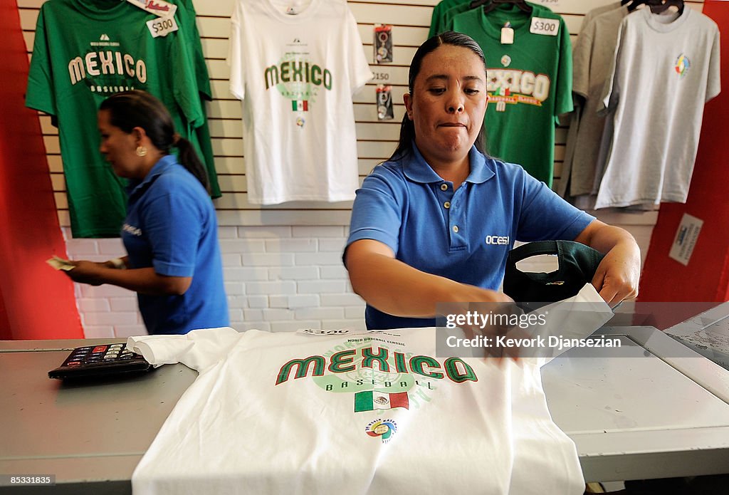 A saleperson fold a shirt of Mexico at a World Baseball Classic store  News Photo - Getty Images