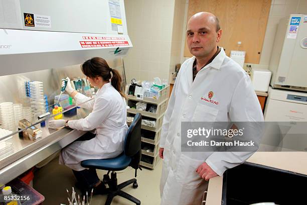 Igor I. Slukvin, center, MD Phd Assistant Professor Department of Pathology and Laboratory Medicine poses for a portrait at the Wisconsin National...