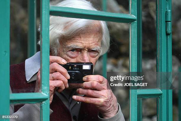 French photographer and reporter Marc Riboud poses at the Musee de la vie romantique/Musee Renan-Scheffer on March 10, 2009 for the inauguration of...