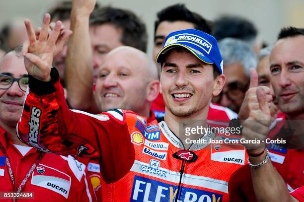 The Spanish rider Jorge Lorenzo of Ducati Team celebrating his 3rd place with his team, during the Gran Premio Movistar de Aragón on September 24,...