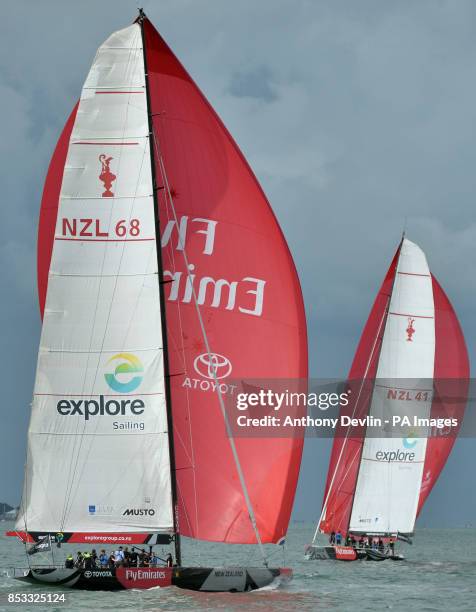 The Duke and Duchess of Cambridge race against each other on two Emirates Team New Zealand Americas Cup yachts as they sail around Auckland Harbour...