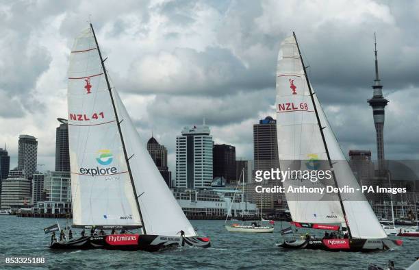 The Duke and Duchess of Cambridge race against each other on two Emirates Team New Zealand Americas Cup yachts as they sail around Auckland Harbour...