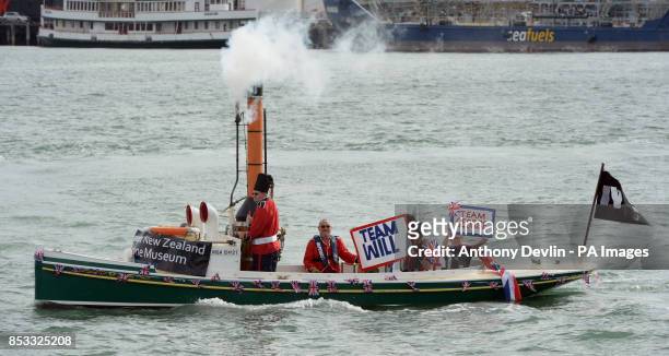 Well wishers look-on as the Duke and Duchess of Cambridge race against each other on two Emirates Team New Zealand Americas Cup yachts as they sail...
