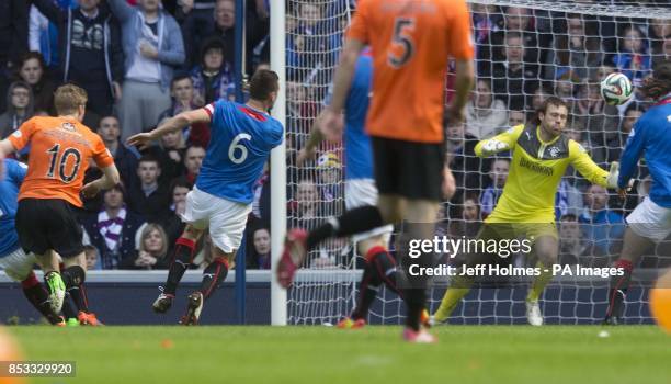 Dundee United's Stuart Armstrong scores opening goal during the William Hill Scottish Cup Semi Final match at Ibrox, Glasgow.