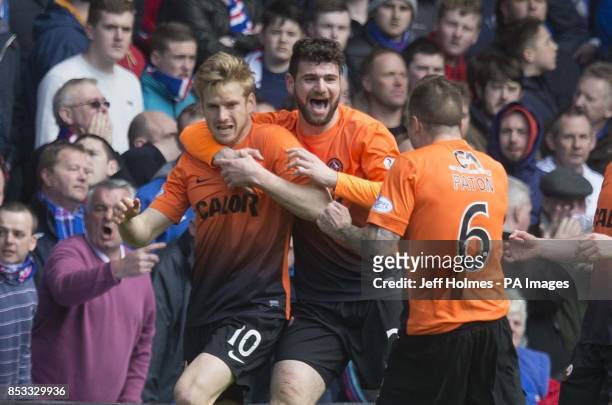 Dundee United's Stuart Armstrong celebrates scoring opening goal during the William Hill Scottish Cup Semi Final match at Ibrox, Glasgow.