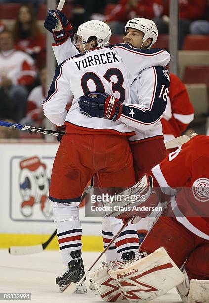 Jakub Voracek of the Columbus Blue Jackets congratulates teammate R.J. Umberger after scoring a goal in a game against the Detroit Red Wings on March...