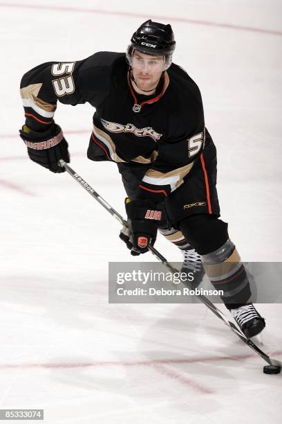 Brett Festerling of the Anaheim Ducks handles the puck against the Minnesota Wild during the game on March 8, 2009 at Honda Center in Anaheim,...