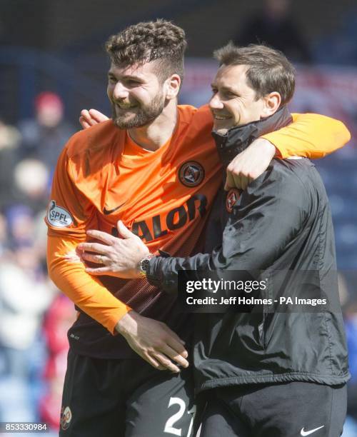 Dundee United's Nadir Ciftci with manager Jackie Mcnamara after the William Hill Scottish Cup Semi Final match at Ibrox, Glasgow.