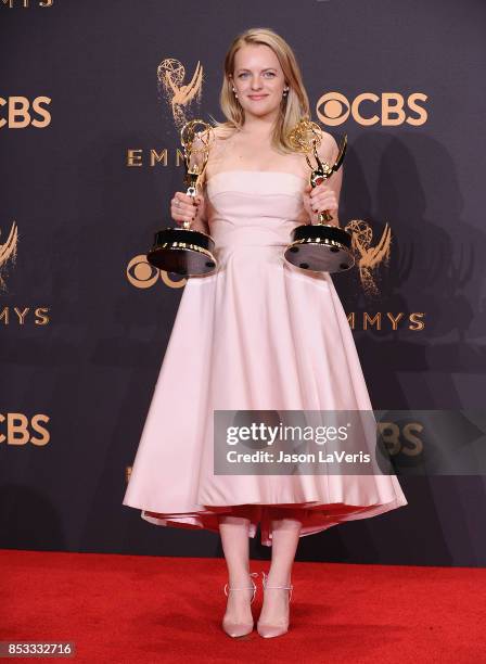 Actress Elisabeth Moss poses in the press room at the 69th annual Primetime Emmy Awards at Microsoft Theater on September 17, 2017 in Los Angeles,...
