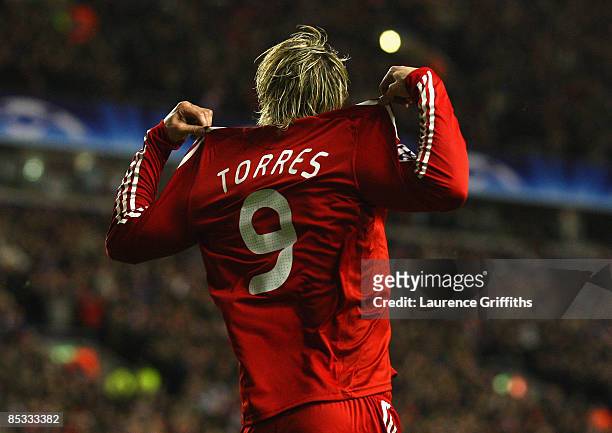 Fernando Torres of Liverpool celebrates scoring the opening goal during the UEFA Champions League Round of Sixteen, Second Leg match between...