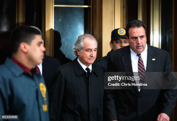 Financier Bernard Madoff leaves Manhattan Federal court March 10, 2009 in New York City. Madoff attended a hearing regarding the conflicting status...