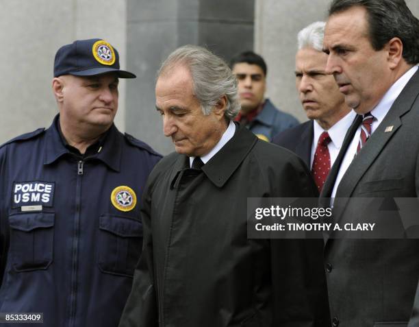 Disgraced Wall Street financier Bernard Madoff leaves US Federal Court after a hearing on March 10, 2009 in New York. Madoff has agreed to plead...