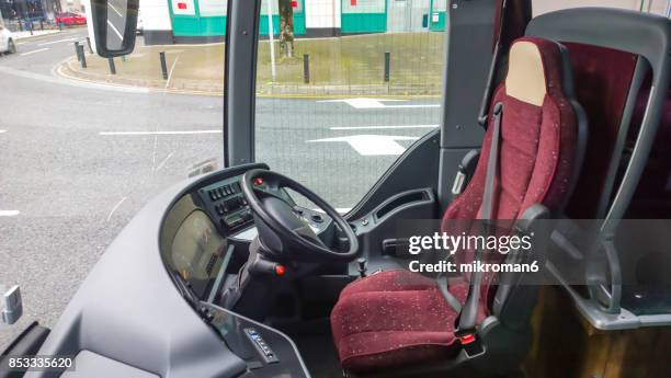 empty driver seat of bus - auto cockpit bildbanksfoton och bilder