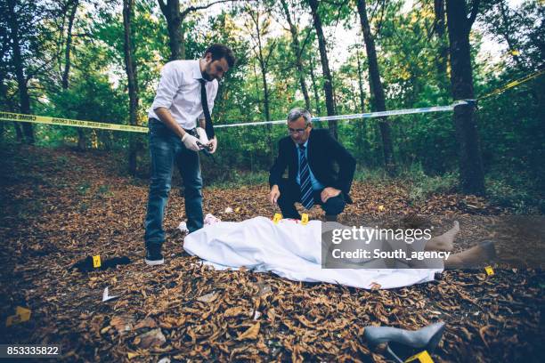 body in the forest - dead body blood stock pictures, royalty-free photos & images