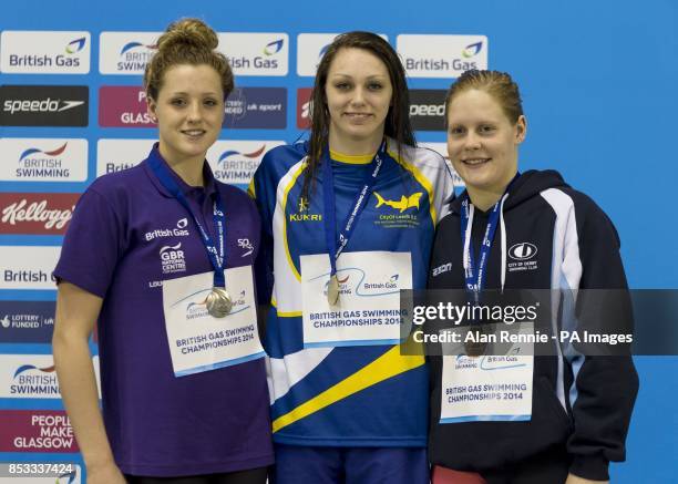 Sophie Taylor collects medal for the Womens open 200m Breaststroke with Molly Renshaw and Danielle Lowe during the 2014 British Gas Swimming...