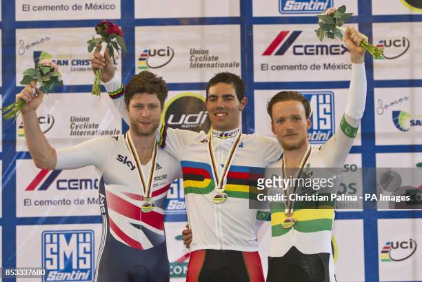 Great Britain's Jon-Allan Butterworth with his silver medal, Spain's Alfonso Cabello with his Gold medal and Australia's Alistair Donohoe with his...