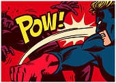 Pop art comics style superhero fighting and punching super villain vector illustration