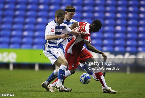 Tresor Kandol of Charlton holds off a challenge during the Coca-Cola Championship match between Reading and Charlton Athletic at Madejski Stadium on...