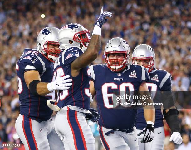 Mike Gillislee of the New England Patriots reacts after scoring a touchdown during the first quarter against the Kansas City Chiefs at Gillette...