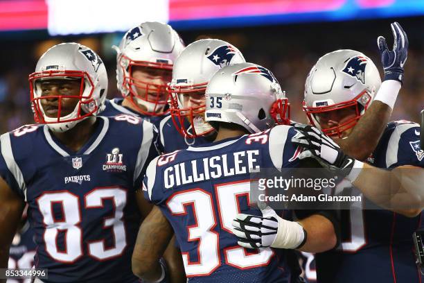 Mike Gillislee of the New England Patriots reacts after scoring a touchdown during the first quarter against the Kansas City Chiefs at Gillette...