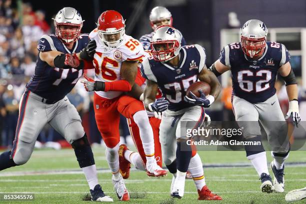 Mike Gillislee of the New England Patriots runs the ball for a touchdown during the second quarter against the Kansas City Chiefs at Gillette Stadium...