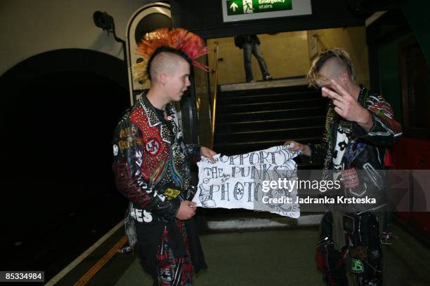 Photo of PUNKS, Punks with mohican hair on the platform at Camden Town tube station