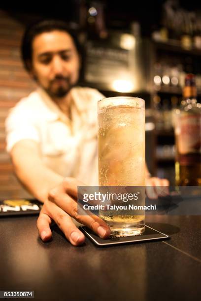 japanese male bartender - coaster stock pictures, royalty-free photos & images