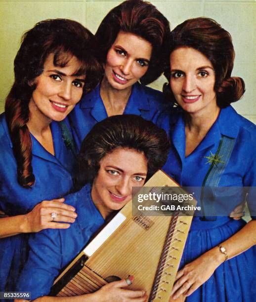 Photo of CARTER FAMILY and Mother Maybelle CARTER and Helen CARTER and Anita CARTER and June CARTER; The Carter Family L-R Anita, Helen and June with...