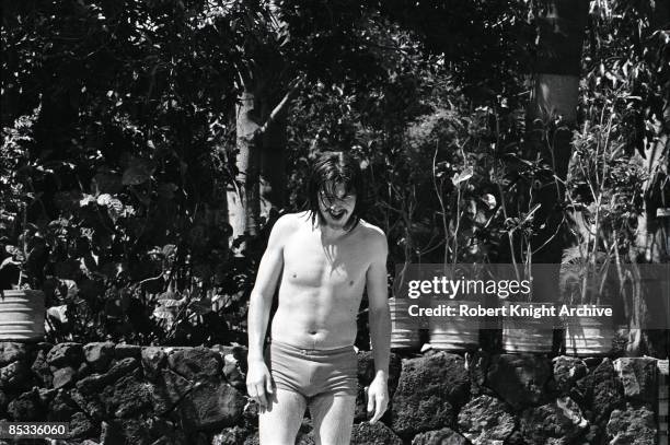 Photo of John BONHAM and LED ZEPPELIN, John Bohnam in swimming trunks