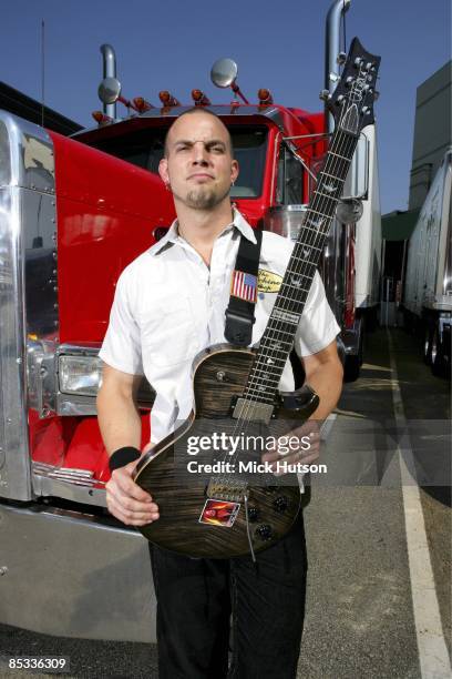 Photo of Mark TREMONTI and ALTER BRIDGE; Posed portrait of Mark Tremonti, truck, guitar