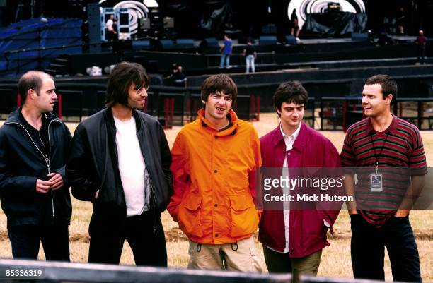 Photo of Alan WHITE and Paul Bonehead ARTHURS and Paul Guigsy McGUIGAN and Liam GALLAGHER and OASIS; Posed group shot backstage L-R Paul 'Bonehead'...