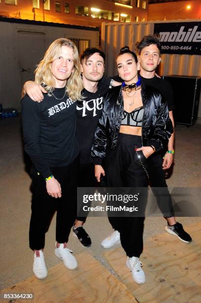 Dua Lipa poses with band members backstage during day 3 of the 2017 Life Is Beautiful Festival on September 24, 2017 in Las Vegas, Nevada.
