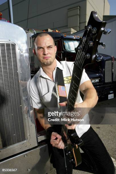 Photo of Mark TREMONTI and ALTER BRIDGE; Posed portrait of Mark Tremonti, truck, guitar