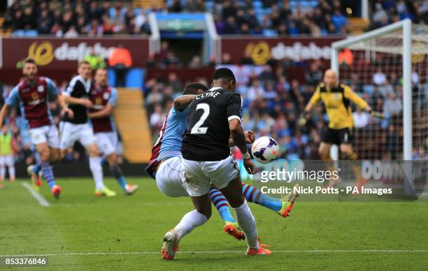 Aston Villa's Ryan Bertrand blocks a cross from Southampton's Nathaniel Clyne